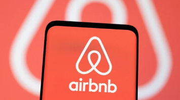 Airbnb logo on phone